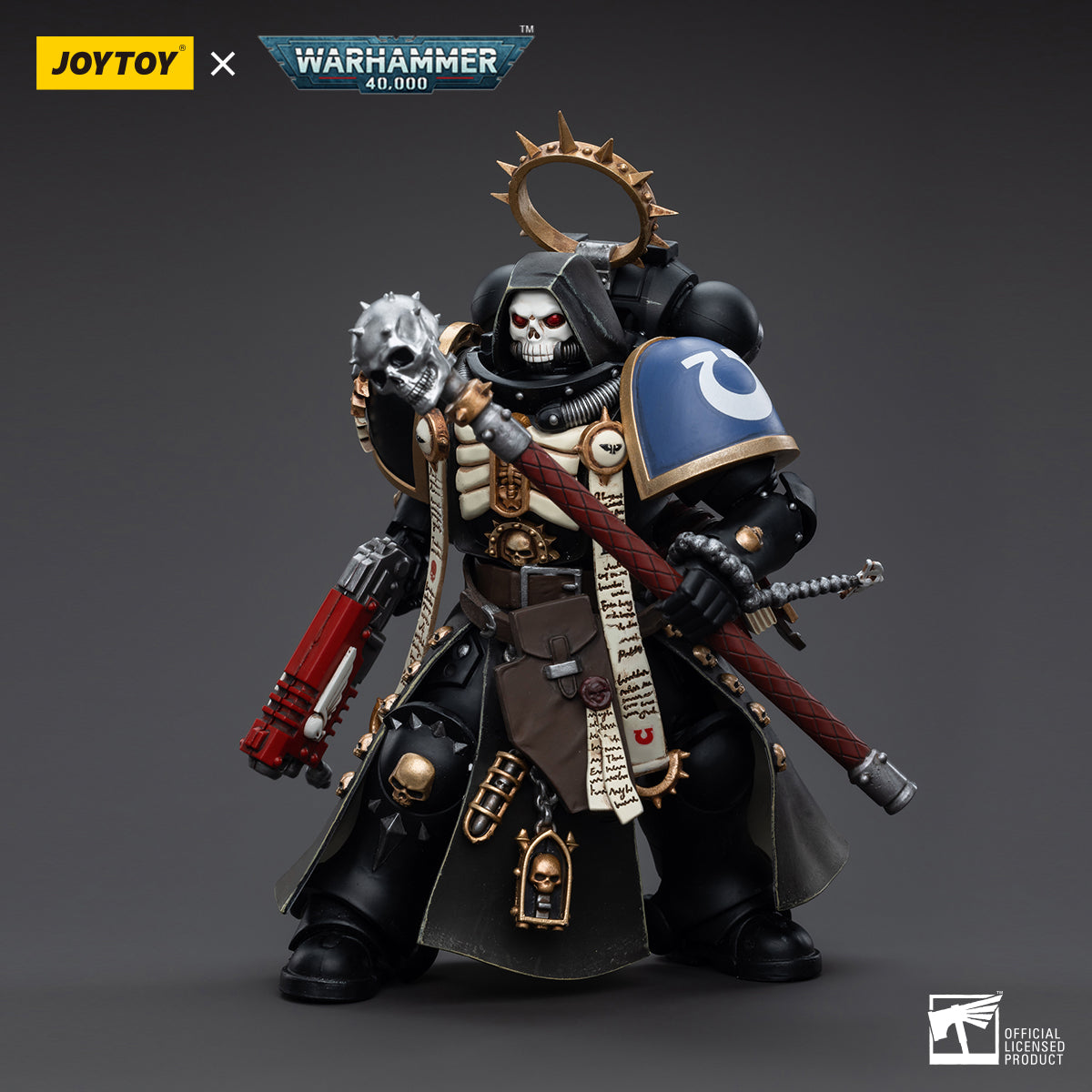 Side view of Joytoy Ultramarines Primaris Chaplain Varus action figure, showcasing intricate armor details and combat gear