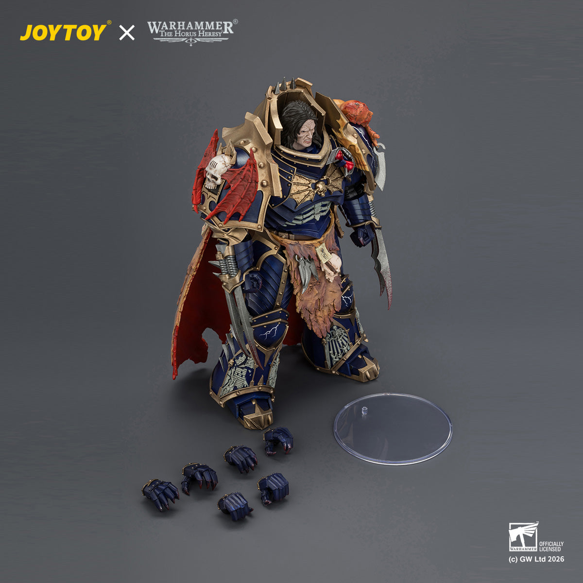Top-down overview of the JOYTOY Warhammer 40K Konrad Curze Primarch action figure, displayed alongside all included accessories including five interchangeable hand sculpts and a clear circular display base.