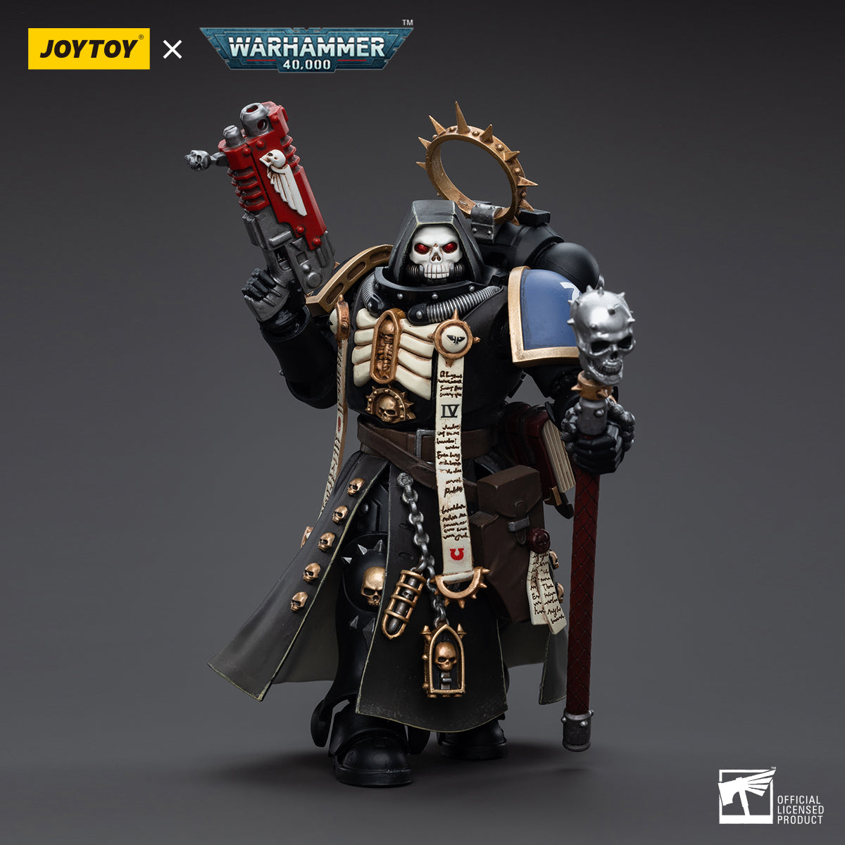 Ultramarines Primaris Chaplain Varus action figure, holding a pistol in his raised right hand and a staff in his left hand, showcasing dynamic combat stance